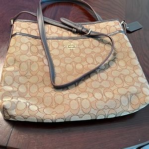 Coach’s cross body. Never used.